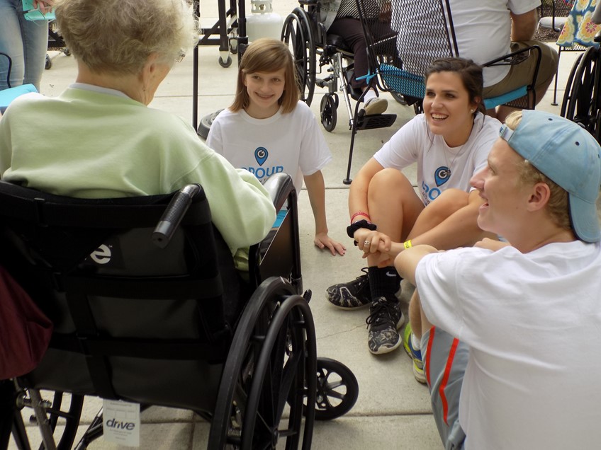 Children smiling with the elderly