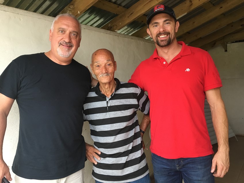 Puerto Rican man with volunteers