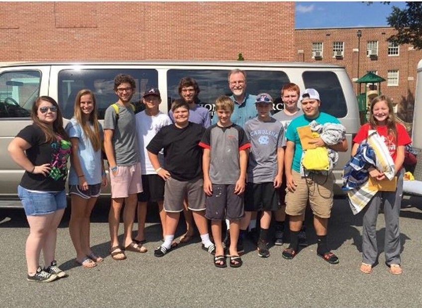 Kids in front of van